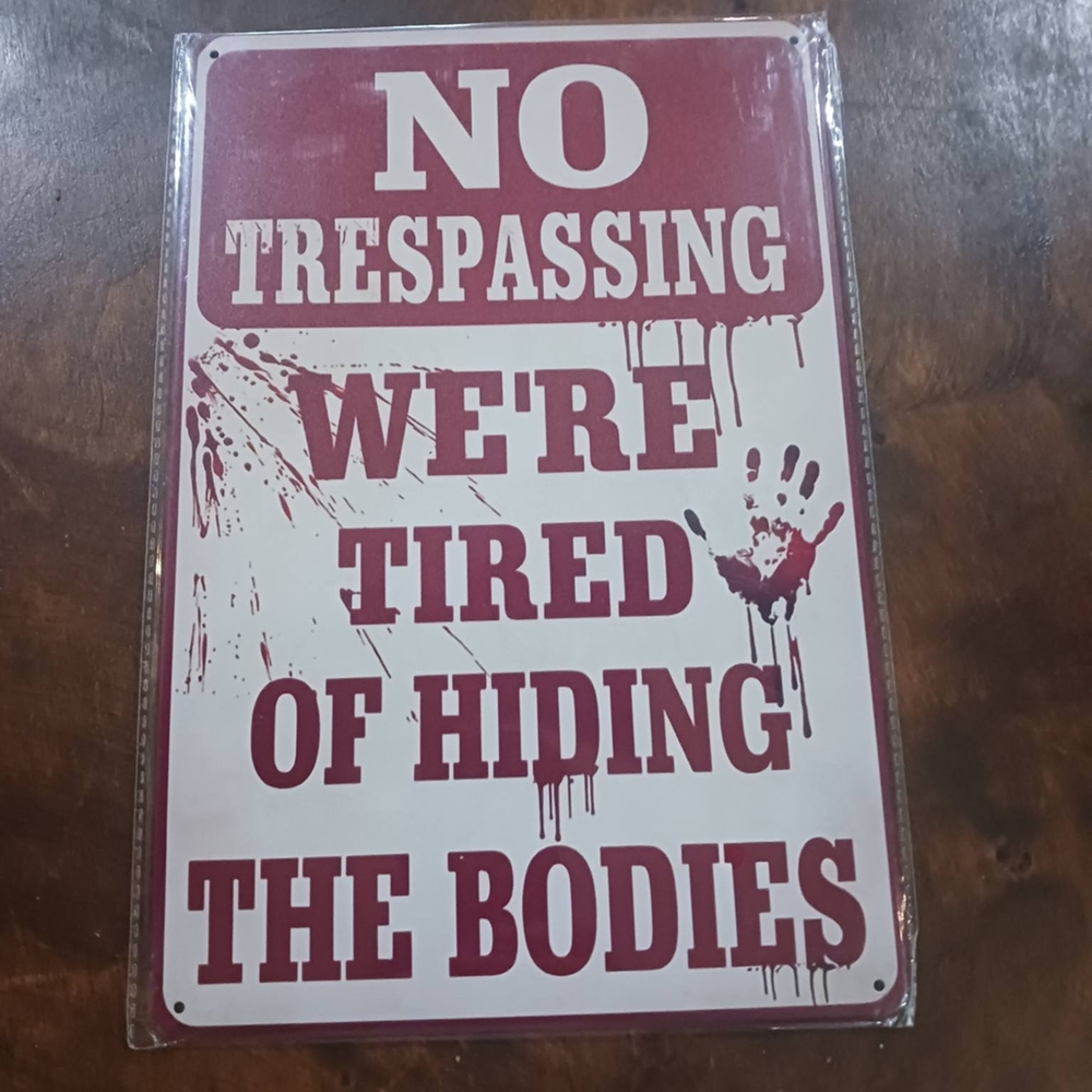 No Trespassing Sign with Humorous Message